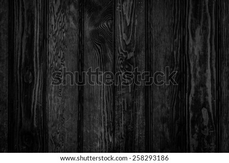 Door made of black wood panels texture - black background in old style