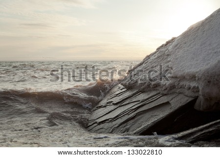Cold waves with beautiful sunset light during the winter.