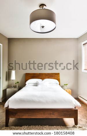 Beautiful Clean and Modern Bedroom with empty wall to add some text, logo, image, etc.