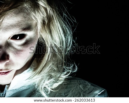 Demon-like Woman with Black Eye Looking at the Camera