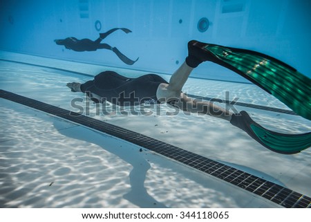 Montreal, CANADA - May 30th, 2015. Official AIDA Freediving Pool Competition Taking place in the Parc Jean-Drapeau Olympic Pool. Dynamic With Fins (DYN) Performance from Underwater