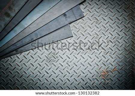 Closeup of metal sheet and metal diamond plate, texture background