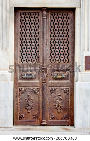 Old iron door with wrought iron ornaments. Taksim - Galata - Istanbul - Turkey - June 2015