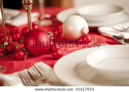 stock photo Red and white Christmas table setting shallow depth of field 