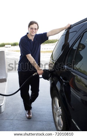 Man pumping gasoline