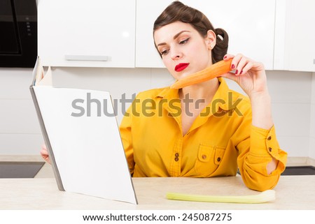 Stylish pin-up housewife in her kitchen