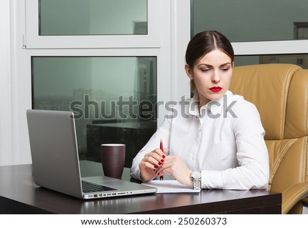Beautiful business lady in office