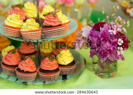 Cupcakes on a stand at the candy bar