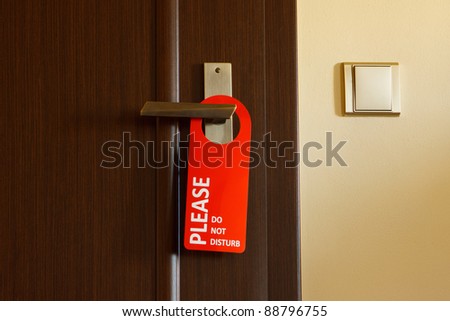 doors with sign for personal -do not disturb