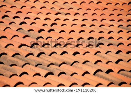 Old red tiles roof background