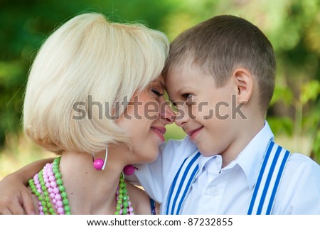Pictures of mother and son:\
\
happy son and mother hugging son