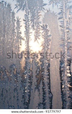 Dawn in the winter morning. Sun for a frosty window.