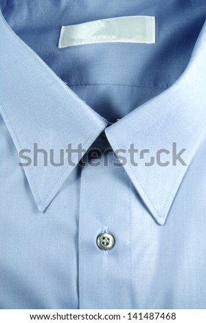 Blue dress shirt for work wear.