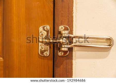 Lock door control in room on hotel.