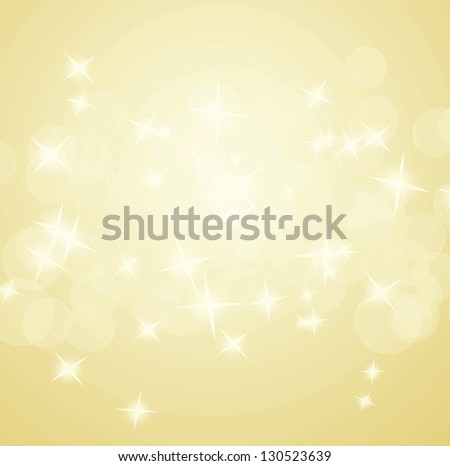 Beautiful gold joyful light background with flash light and sparkling stars