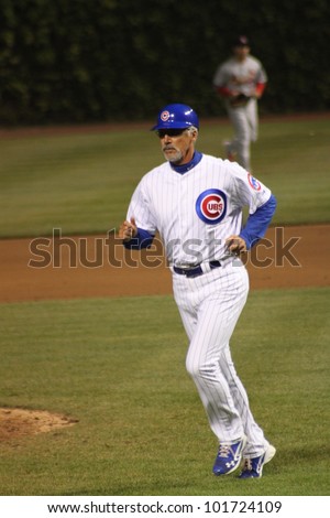 CHICAGO - APRIL 25: Dave Mckay of the Chicago Cubs is the first base coach against the St. Louis Cardinals at Wrigley Field on April 25, 2012 in Chicago, Illinois.