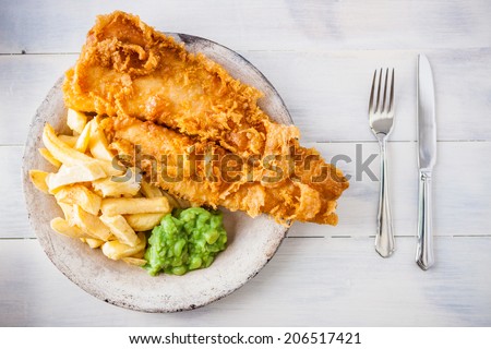 Traditional English food - Fish and chips with mushy peas