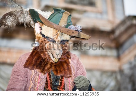 Rat costume with big teeth at the Venice Carnival
