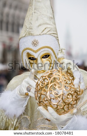 White and gold costume at the Venice Carnival