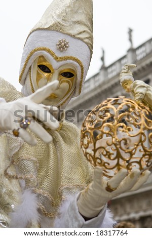 White and gold costume at the Venice Carnival