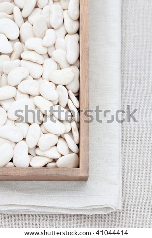White butter beans in a wooden box