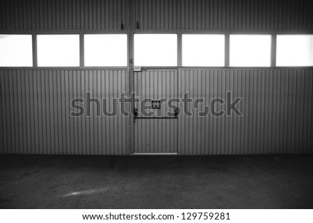 Industrial metal door with windows and door emergency exit