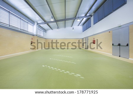 Public school, interior wide gym.