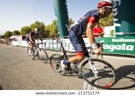 GRANADA, SPAIN - AUGUST 28 - Unknown racers on the competition Tour of Spain (La Vuelta) on August 28, 2014 in Granada, Spain