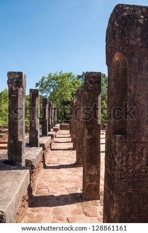 Carved stone pillars in The Council Chamber of King Parakramabahu in ancient city of  Polonnaruwa, Sri Lanka. Unesco World Heritage Site