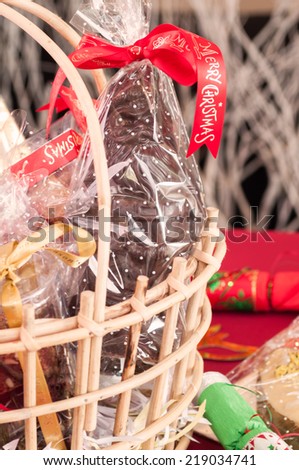 Chocolate Santa in a wicker gift basket close up