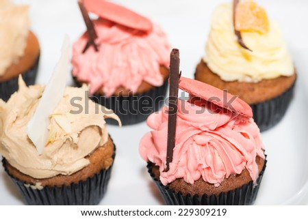 Assorted cup cakes close up