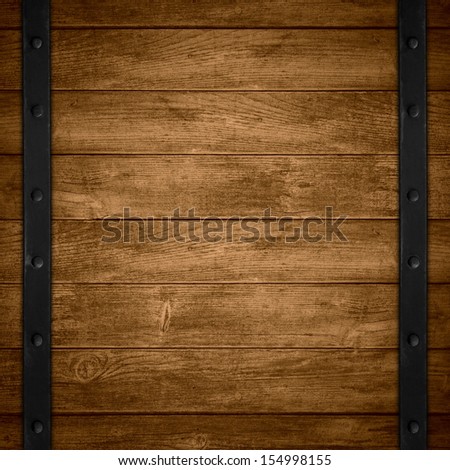 brown wooden background with black metal border or wood grain texture