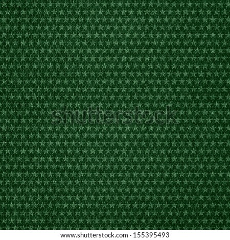 star pattern background or light green stars on woven canvas dark texture