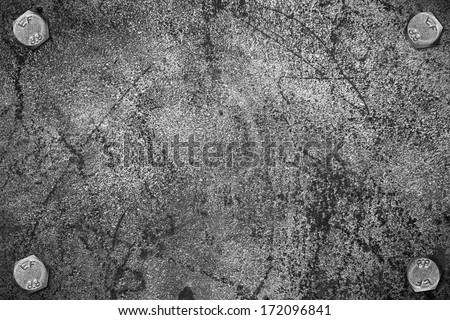 grey steel background or black and white metal texture with screws