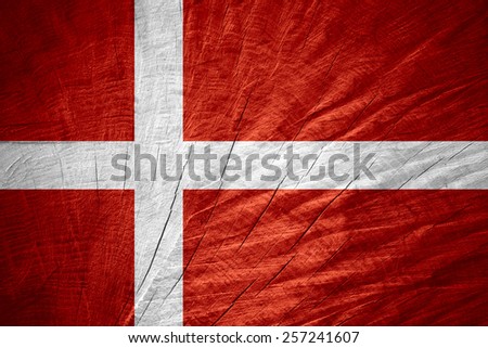 Denmark flag or Danish banner on wooden texture