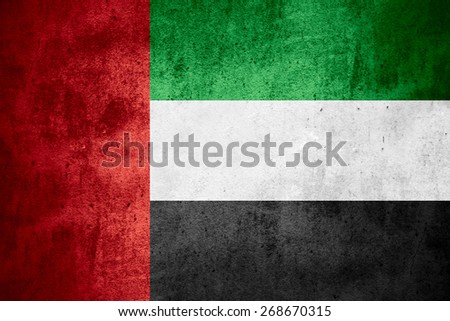 flag of United Arab Emirates or United Arabian Emirates banner on rough pattern texture background