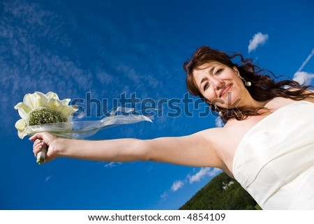 stock photo Fancy Perspective Bride holds her bridal bouquet on 