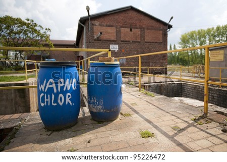 Barrels containing chemicals stored in an old sewage treatment plant
