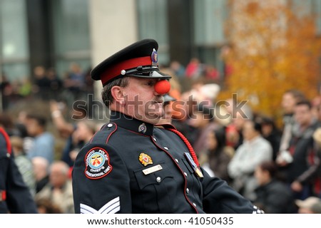 TORONTO-NOVEMBER 15: The Toronto Police Chief\'s Ceremonial Unit join in the fun of the Toronto Santa Close Parade on November 15, 2009 in Toronto, Canada.