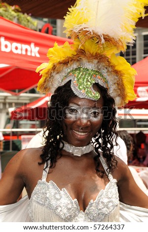 TORONTO - JULY 15: Participant in the Caribana 2010 Festival, a cultural explosion of Caribbean music, cuisine and performing arts on July 15, 2010 In Toronto.