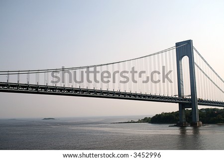 Verrazano Narrows Bridge shot from underneath connecting Brooklyn NY to Staten Island NY (suspension bridge)