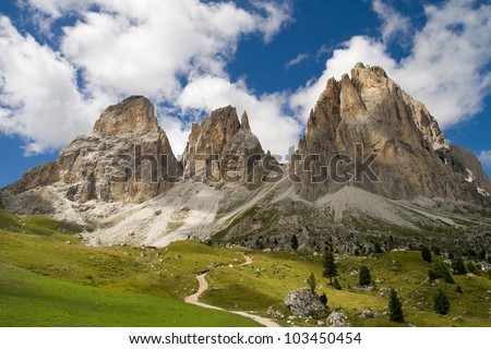 The three peaks of the Sassolungo Langkofel in the Dolomites Italy The three peaks of the Sassolungo Langkofel in the Dolomites Italy