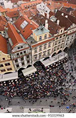 People waiting for the clock to chime in the old town square (Staromestske Namesti) of Prague, Czech Republic.