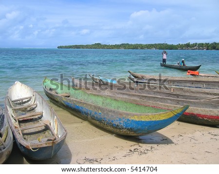 Many small boats on the Nattes island sand beach - Nosy Boraha - Sainte-Marie island - Madagascar.