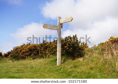 Wales Coast Path signposts to areas of outstanding natural beauty