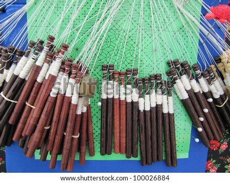 Bobbin lace, traditional textile crafts.