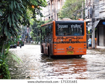 BANGKOK, THAILAND - OCTOBER 30 : Heavy flooding from monsoon rain in Ayutthaya and north Thailand arriving in Bangkok on October 30,2011 Bangkok, Thailand
