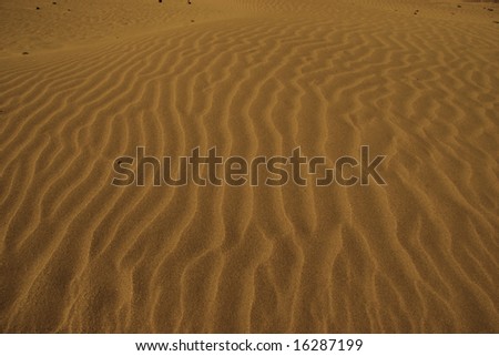 a rippled golden sandy beach in county kerry ireland