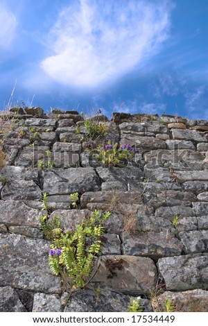 an irish old irish wall in Kerry on the west coast of Ireland with a sky background