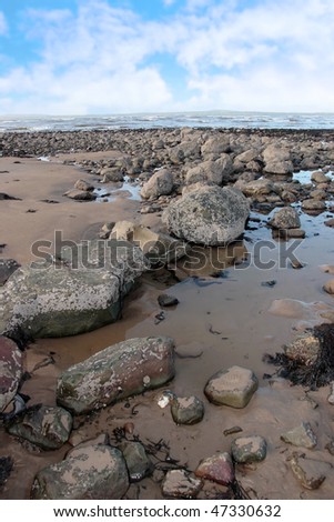 rocks on beale beach co kerry ireland on a cold winters day